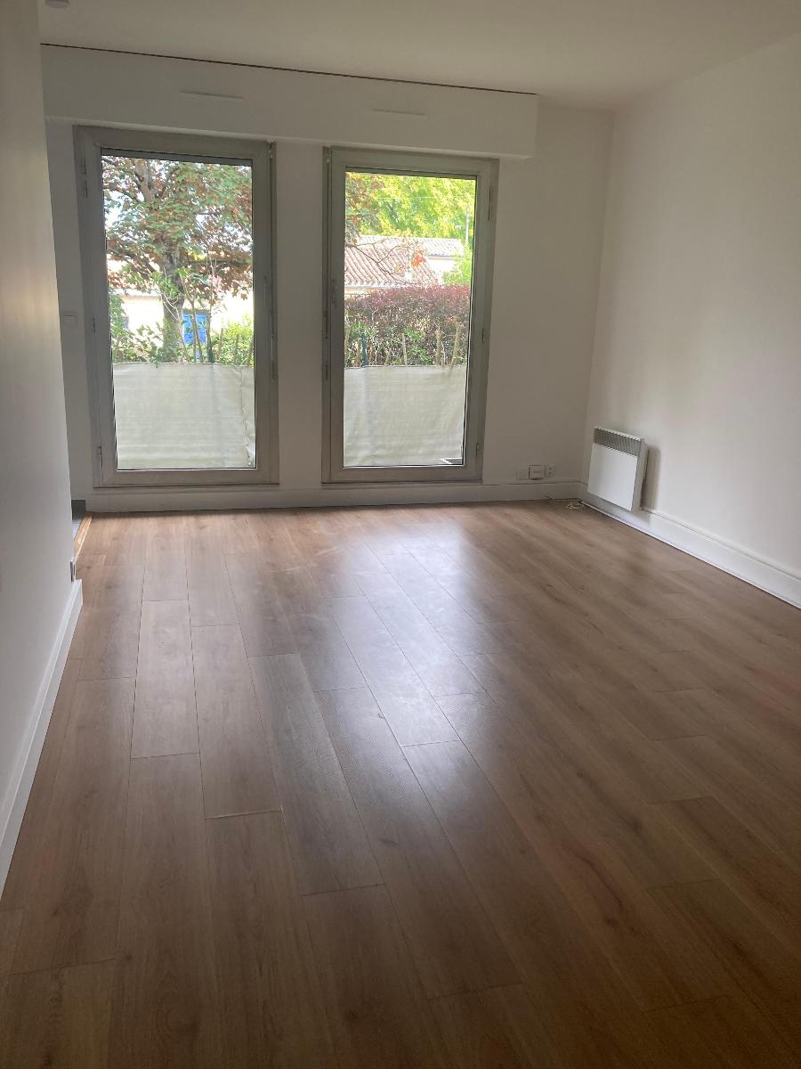 Appartement - 27,75 m² - jardin - parking - cave